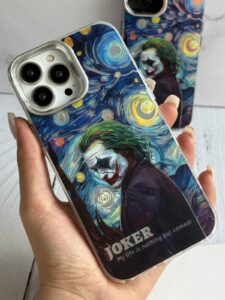 قاب موبایل آیفون لبخند جوکر هلوگرامی محافظ دوربین استندشو - تصویر 3