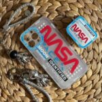 قاب موبایل آیفون ناسا دورنقره ای پشت بی رنگ