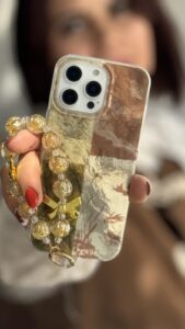 قاب موبایل آیفون براش پروانه طلایی + بندست پاپیون