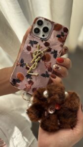 قاب موبایل آیفون سن لورن دم روباهی پروانه گل سرخ + بندست پشمی - تصویر 2