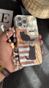 قاب موبایل ( آیفون ) پلنگی گربه سیاه میو + بندست