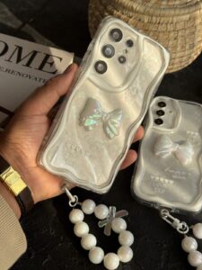 قاب موبایل ( آیفون - سامسونگ ) پاپیون هفت رنگ سفید صدفی ( بدون بند ) - تصویر 3