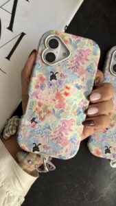 قاب موبایل آیفون خرگوش واندرلند + بندست گل پارچه ای - تصویر 2