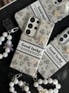 قاب موبایل ( آیفون - سامسونگ - شیائومی ) گل شانس صدفی + بندست - تصویر 3