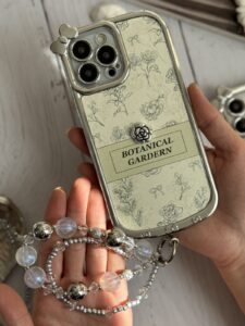قاب موبایل آیفون باغ سلطنتی + بند ست مروارید