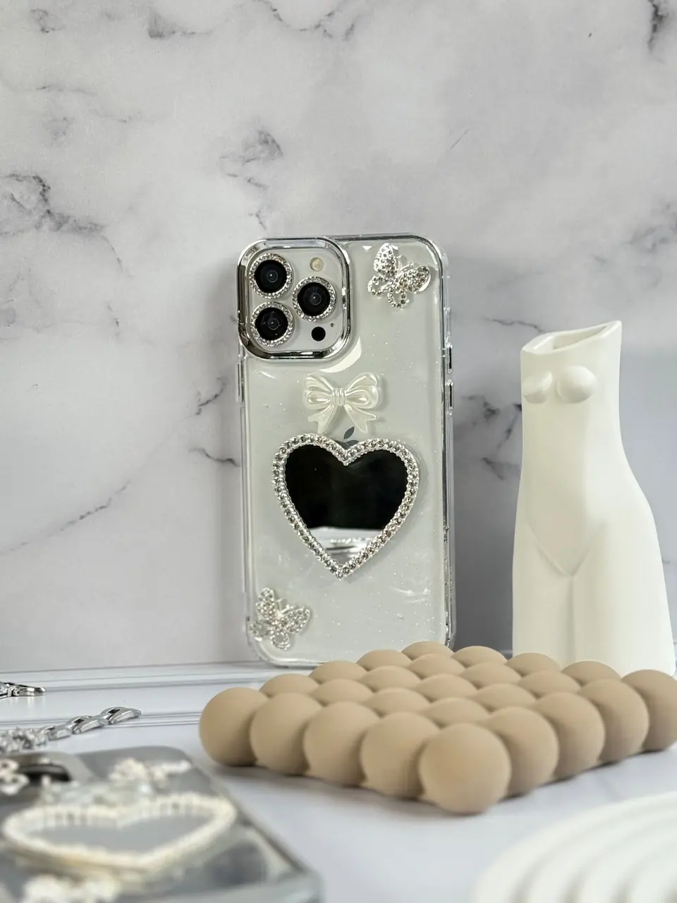 a54c8f قاب شاینی قلب آینه ای با محافظ لنز رینگی نگینی (کدC1889) - تصویر 1